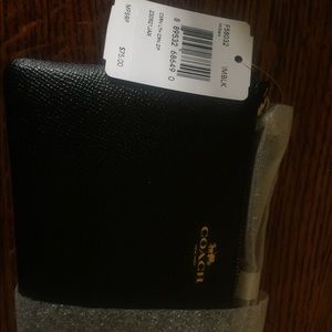 Coach black pebble leather wristlet